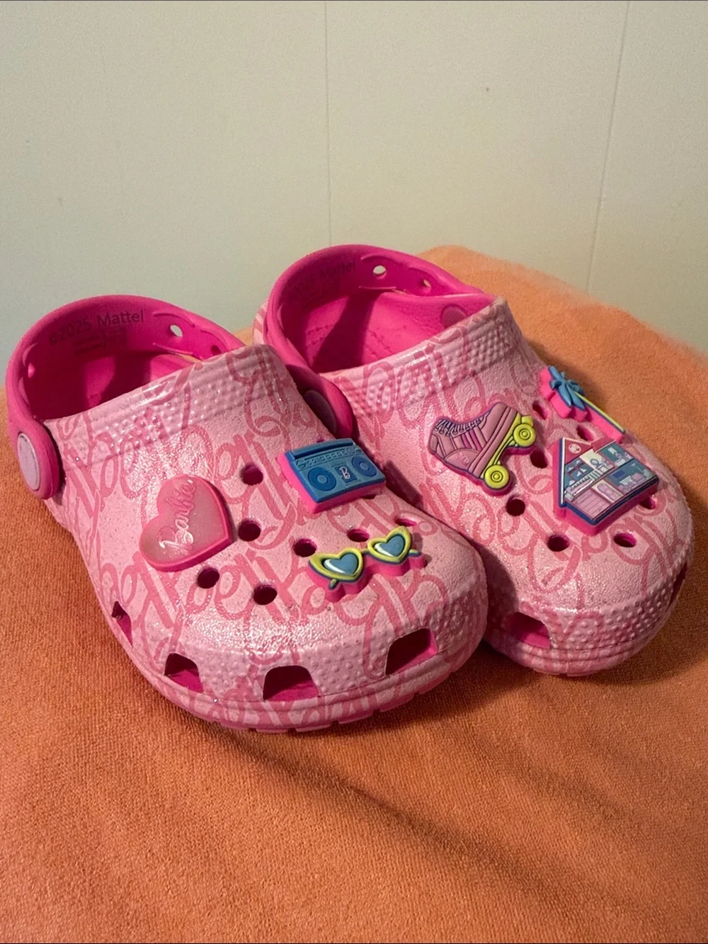 CROCS Kids Pink Patterned Clogs with Charm Accents